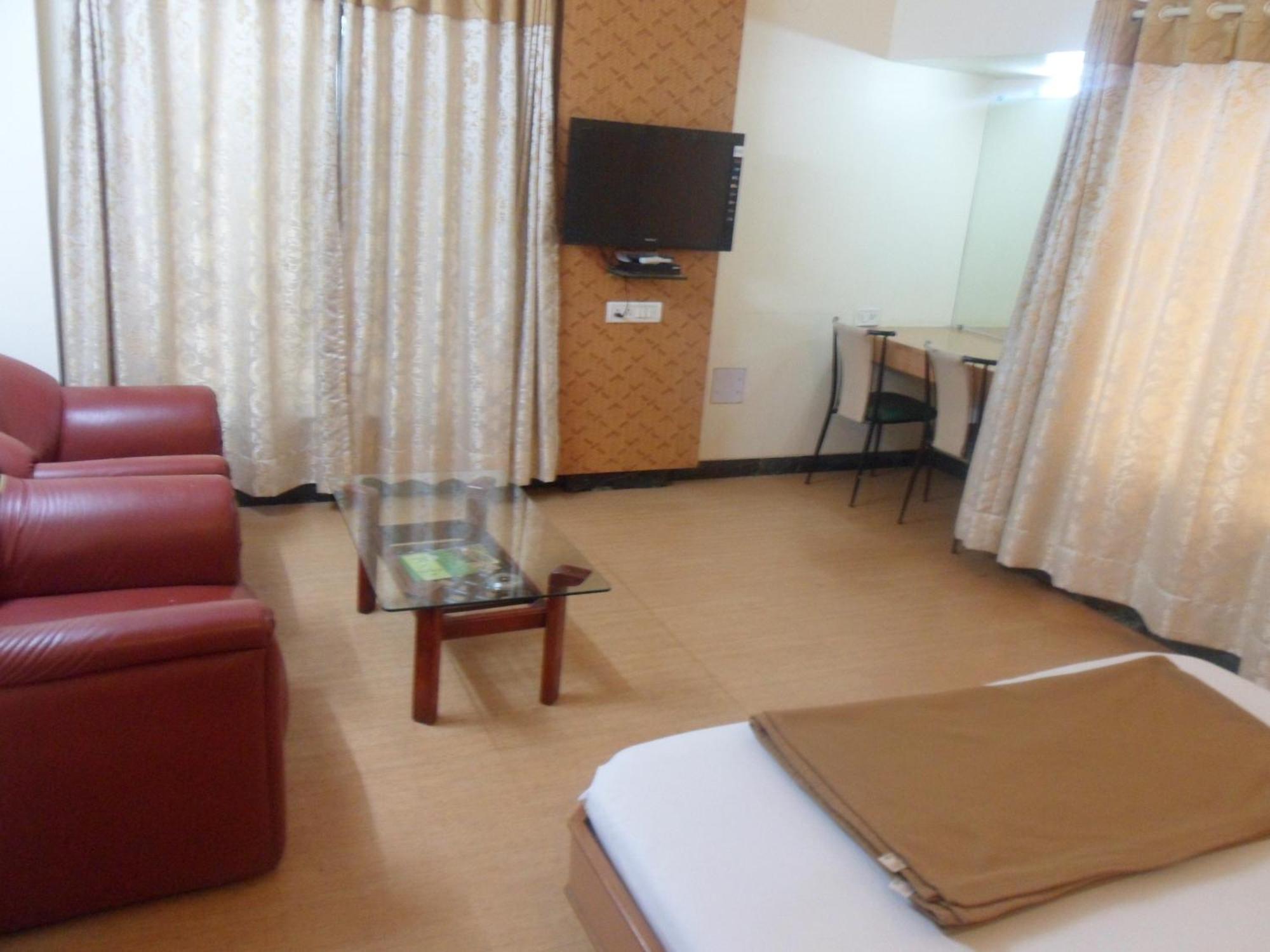 Hotel Pooja International Nashik Habitación foto